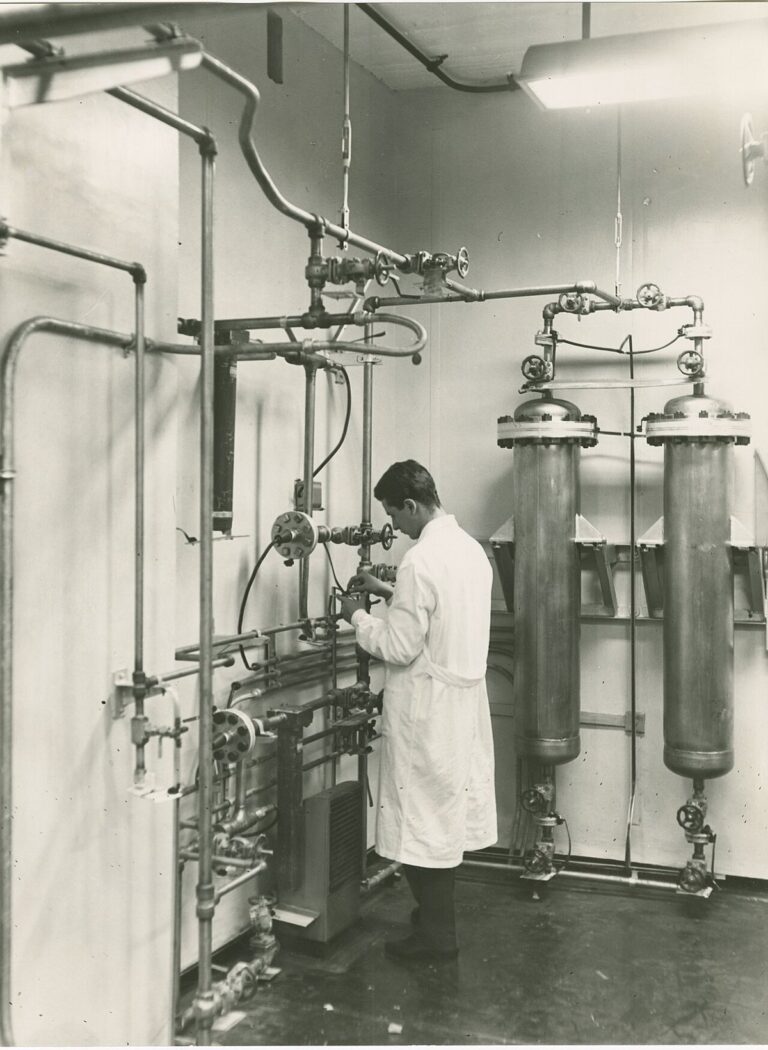 The Reactor Fuel That Eats Its Container, and the Race to Stop It Engineers inspecting industrial reactor equipment